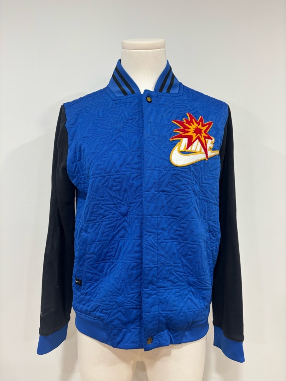 Nike Blue and Black Quilted Varsity Jacket with Embroidered Swoosh Patch